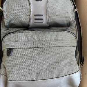 SOLD - Tumi laptop backpack paid $550. Model 541G Gray w laptop & other sections